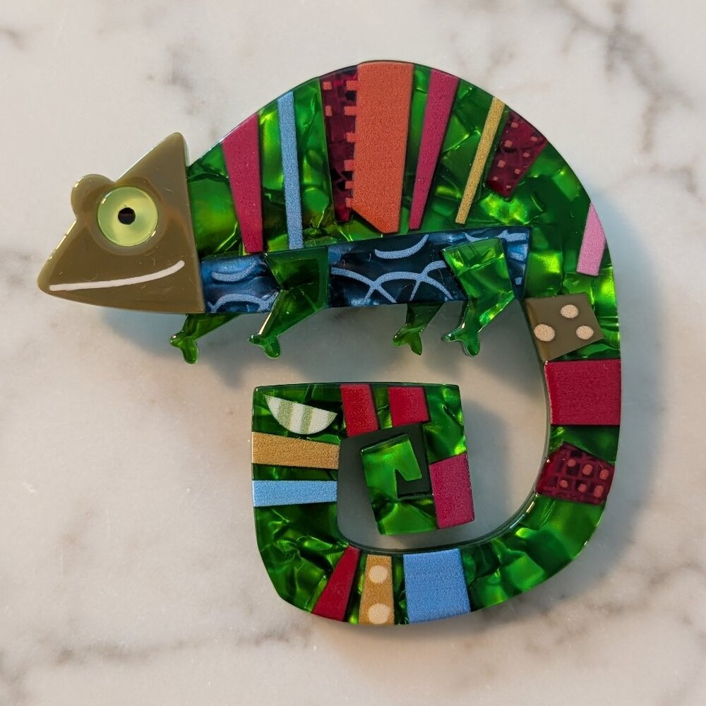 Erstwilder A Chameleon Named Pop brooch.